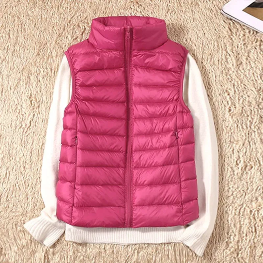 Fleur gewatteerde bodywarmer in rozerood